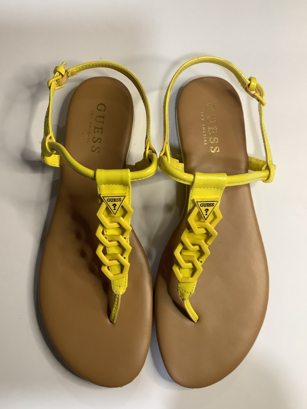 Guess Yellow Flat T-Strap Sandals with Unique Geometric Interlocking Chain Link
